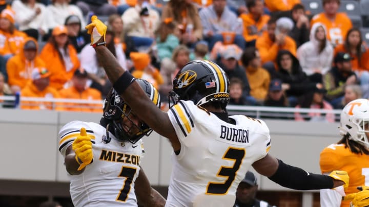 Nov 12, 2022; Knoxville, Tennessee, USA; Missouri Tigers wide receiver Dominic Lovett (7) celebrates with wide receiver Luther Burden III (3) after scoring a touchdown against the Tennessee Volunteers during the second half at Neyland Stadium. Mandatory Credit: Randy Sartin-USA TODAY Sports