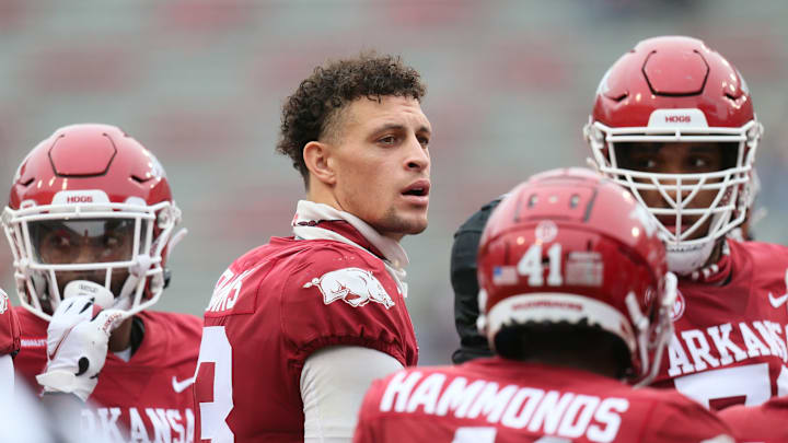 Nov 21, 2020; Fayetteville, Arkansas, USA; Arkansas Razorbacks quarterback Feleipe Franks (second from left) looks on during the game against the LSU Tigers at Donald W. Reynolds Razorback Stadium. Mandatory Credit: Nelson Chenault-USA TODAY Sports