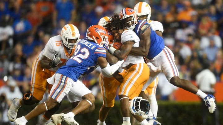 Tennessee running back Tiyon Evans (8) looses his helmet during an NCAA football game against Florida at Ben Hill Griffin Stadium in Gainesville, Florida on Saturday, Sept. 25, 2021.Tennflorida0925 1819