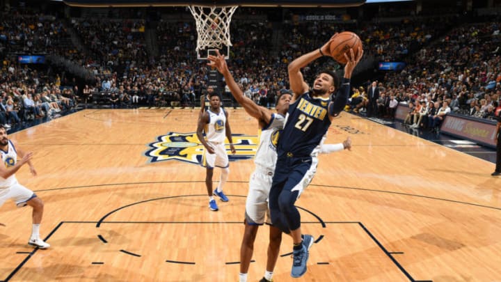 DENVER, CO - NOVEMBER 4: Jamal Murray #27 of the Denver Nuggets drives to the basket against the Golden State Warriors on November 4, 2017 at the Pepsi Center in Denver, Colorado. NOTE TO USER: User expressly acknowledges and agrees that, by downloading and/or using this Photograph, user is consenting to the terms and conditions of the Getty Images License Agreement. Mandatory Copyright Notice: Copyright 2017 NBAE (Photo by Garrett Ellwood/NBAE via Getty Images)