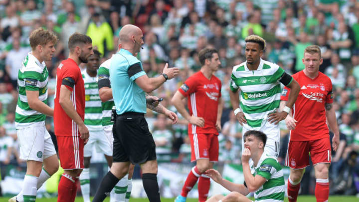 GLASGOW, SCOTLAND - MAY 27: Kieran Tierney of Celtic sits on the turf with a facial injury that forced him to be substituted in the first half during the William Hill Scottish Cup Final between Aberdeen and Celtic at Hampden Park on May 27, 2017 in Glasgow, Scotland. (Photo by Mark Runnacles/Getty Images)