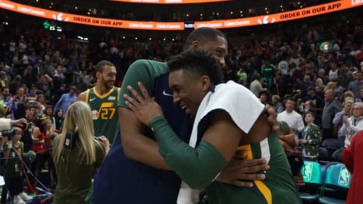SALT LAKE CITY, UT – DECEMBER 25: Derrick Favors #15 and Donovan Mitchell #45 of the Utah Jazz high-five after a game against the Portland Trail Blazers on December 25, 2018 at vivint.SmartHome Arena in Salt Lake City, Utah. NOTE TO USER: User expressly acknowledges and agrees that, by downloading and or using this Photograph, User is consenting to the terms and conditions of the Getty Images License Agreement. Mandatory Copyright Notice: Copyright 2018 NBAE (Photo by Melissa Majchrzak/NBAE via Getty Images)