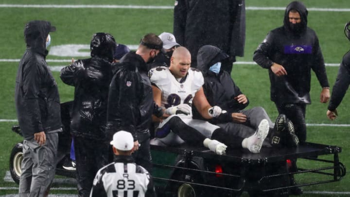 FOXBOROUGH, MASSACHUSETTS - NOVEMBER 15: Nick Boyle #86 of the Baltimore Ravens leaves the field on a cart after being injured during the second half against the New England Patriots at Gillette Stadium on November 15, 2020 in Foxborough, Massachusetts. (Photo by Adam Glanzman/Getty Images)