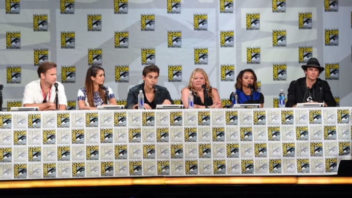SAN DIEGO, CA - JULY 26: (L-R) Actors Matthew Davis, Nina Dobrev and Paul Wesley, writer/producer Julie Plec, actors Kat Graham and Ian Somerhalder attend CW's "The Vampire Diaries" panel during Comic-Con International 2014 at the San Diego Convention Center on July 26, 2014 in San Diego, California. (Photo by Ethan Miller/Getty Images)