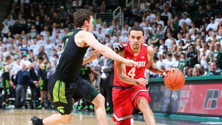 EAST LANSING, MI - FEBRUARY 17: Duane Washington Jr. #4 of the Ohio State Buckeyes drives past Foster Loyer #3 of the Michigan State Spartans in the second half at Breslin Center on February 17, 2019 in East Lansing, Michigan. (Photo by Rey Del Rio/Getty Images)
