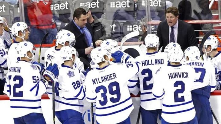 Mar 2, 2016; Washington, DC, USA; Toronto Maple Leafs head coach Mike Babcock (R) talks to his team during a timeout against the Washington Capitals in the third period at Verizon Center. The Capitals won 3-2. Mandatory Credit: Geoff Burke-USA TODAY Sports