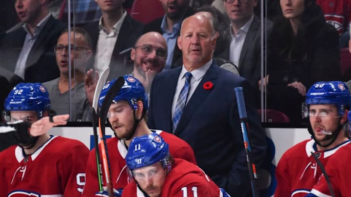 MONTREAL, QC - NOVEMBER 05: Head coach of the Montreal Canadiens Claude Julien looks on from behind the bench as he coaches in his 1,200th career NHL game against the Boston Bruins during the first period at the Bell Centre on November 5, 2019 in Montreal, Canada. The Montreal Canadiens defeated the Boston Bruins 5-4. (Photo by Minas Panagiotakis/Getty Images)