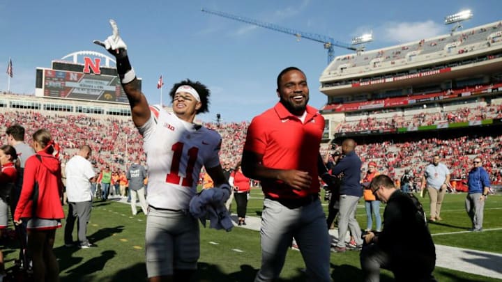 Ohio State Buckeyes wide receiver Jaxon Smith-Njigba (11) points to Ohio State fans in the stands as he runs off the field following Saturday's NCAA Division I football game against the Nebraska Cornhuskers at Memorial Stadium in Lincoln, Neb., on November 6, 2021. Ohio State won the game 26-17.Osu21neb Bjp 1140