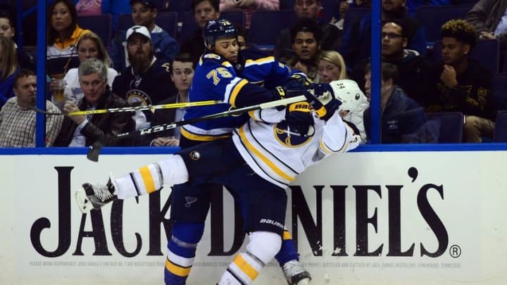 Nov 15, 2016; St. Louis, MO, USA; St. Louis Blues right wing Ryan Reaves (75) checks Buffalo Sabres defenseman Casey Nelson (34) during the second period at Scottrade Center. Mandatory Credit: Jeff Curry-USA TODAY Sports