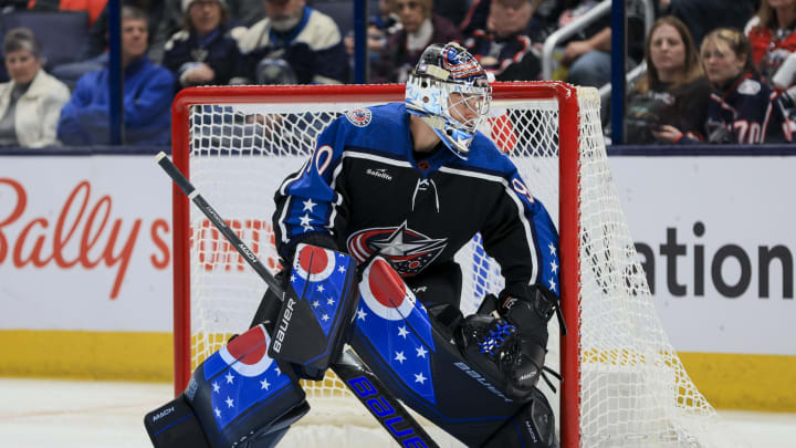 Dec 9, 2022; Columbus, Ohio, USA; Columbus Blue Jackets goaltender Elvis Merzlikins (90) follows the puck in play against the Calgary Flames in the second period at Nationwide Arena. Mandatory Credit: Aaron Doster-USA TODAY Sports