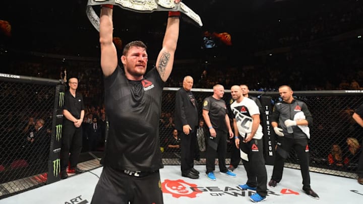 MANCHESTER, ENGLAND - OCTOBER 08: Michael Bisping of England celebrates his victory over Dan Henderson in their UFC middleweight championship bout during the UFC 204 Fight Night at the Manchester Evening News Arena on October 8, 2016 in Manchester, England. (Photo by Josh Hedges/Zuffa LLC/Zuffa LLC via Getty Images)