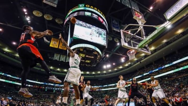 Apr 14, 2015; Boston, MA, USA; Toronto Raptors forward Terrence Ross (31) shoots against Boston Celtics forward Brandon Bass (30) in the first half at TD Garden. Mandatory Credit: David Butler II-USA TODAY Sports