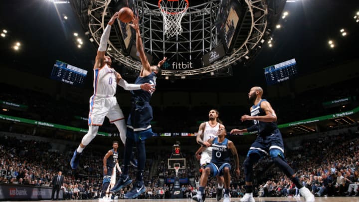 MINNEAPOLIS, MN - OCTOBER 27: Karl-Anthony Towns #32 of the Minnesota Timberwolves blocks the shot of Russell Westbrook #0 of the Oklahoma City Thunder on October 27, 2017 at Target Center in Minneapolis, Minnesota. NOTE TO USER: User expressly acknowledges and agrees that, by downloading and/or using this photograph, user is consenting to the terms and conditions of the Getty Images License Agreement. Mandatory Copyright Notice: Copyright 2017 NBAE (Photo by David Sherman/NBAE via Getty Images)