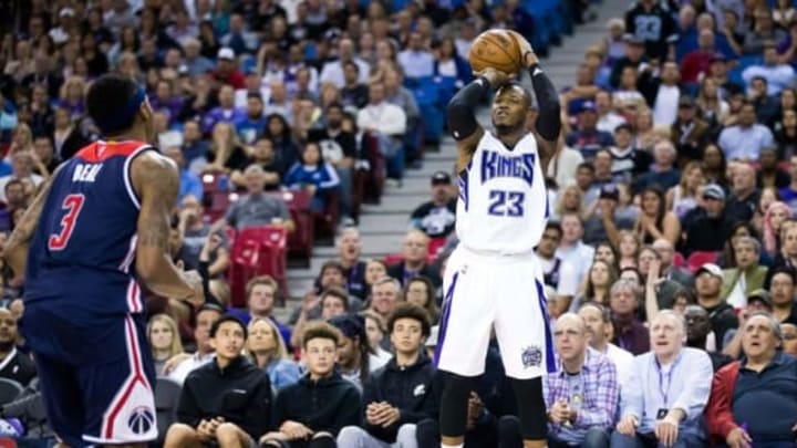 Mar 30, 2016; Sacramento, CA, USA; Sacramento Kings guard Ben McLemore (23) shoots the ball against Washington Wizards guard Bradley Beal (3) during the fourth quarter at Sleep Train Arena. The Sacramento Kings defeated the Washington Wizards 120-111. Mandatory Credit: Kelley L Cox-USA TODAY Sports