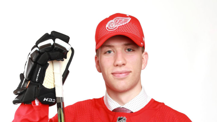 DALLAS, TX - JUNE 23: Jared McIsaac poses after being selected thirty-sixth overall by the Detriot Red Wings during the 2018 NHL Draft at American Airlines Center on June 23, 2018 in Dallas, Texas. (Photo by Tom Pennington/Getty Images)
