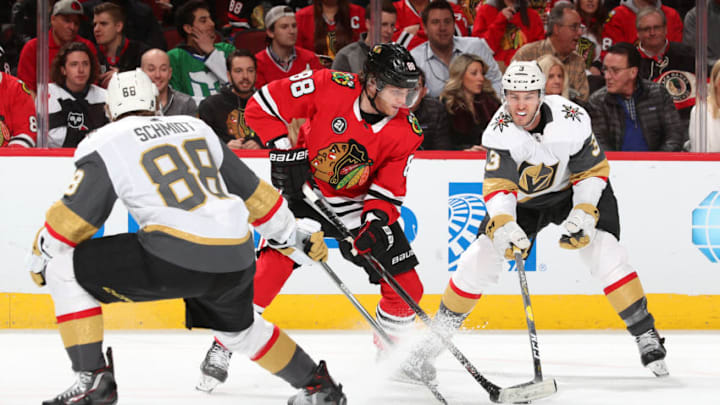 CHICAGO, IL - JANUARY 12: Patrick Kane #88 of the Chicago Blackhawks and Brayden McNabb #3 of the Vegas Golden Knights battle for the puck in the second period at the United Center on January 12, 2019 in Chicago, Illinois. (Photo by Chase Agnello-Dean/NHLI via Getty Images)