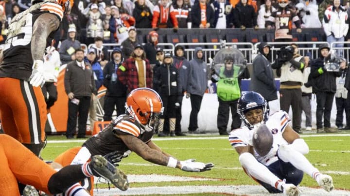 Dec 17, 2023; Cleveland, Ohio, USA; Chicago Bears wide receiver Darnell Mooney (11) reaches for the ball on a Hail Mary pass against the Cleveland Browns during the fourth quarter at Cleveland Browns Stadium. Mandatory Credit: Scott Galvin-USA TODAY Sports