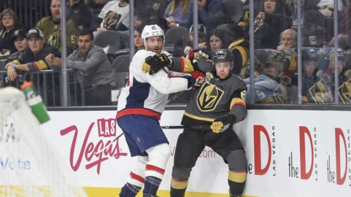 LAS VEGAS, NV - DECEMBER 23: Brooks Orpik #44 of the Washington Capitals defends Jonathan Marchessault #81 of the Vegas Golden Knights during the game at T-Mobile Arena on December 23, 2017 in Las Vegas, Nevada. (Photo by David Becker/NHLI via Getty Images)