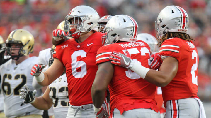 COLUMBUS, OH - SEPTEMBER 16: Ohio State Buckeyes defensive end Sam Hubbard (6) celebrates a defensive play with teammates Ohio State Buckeyes defensive tackle Davon Hamilton (53) and Ohio State Buckeyes defensive end Chase Young (2) during game action between the Army Black Knights and the Ohio State Buckeyes (8) on September 16, 2017 at Ohio Stadium in Columbus, Ohio. Ohio State defeated Army 38-7. (Photo by Scott W. Grau/Icon Sportswire via Getty Images)