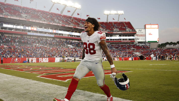 TAMPA, FLORIDA – SEPTEMBER 22: Evan Engram #88 of the New York Giants celebrates after defeating the Tampa Bay Buccaneers 32-31 at Raymond James Stadium on September 22, 2019 in Tampa, Florida. (Photo by Michael Reaves/Getty Images)