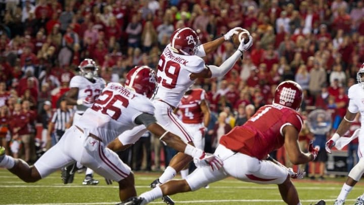 Oct 8, 2016; Fayetteville, AR, USA; Alabama Crimson Tide defensive back Minkah Fitzpatrick (29) intercepts the ball intended for Arkansas Razorbacks wide receiver Jared Cornelius (1) during the fourth quarter at Donald W. Reynolds Razorback Stadium. Mandatory Credit: Brett Rojo-USA TODAY Sports