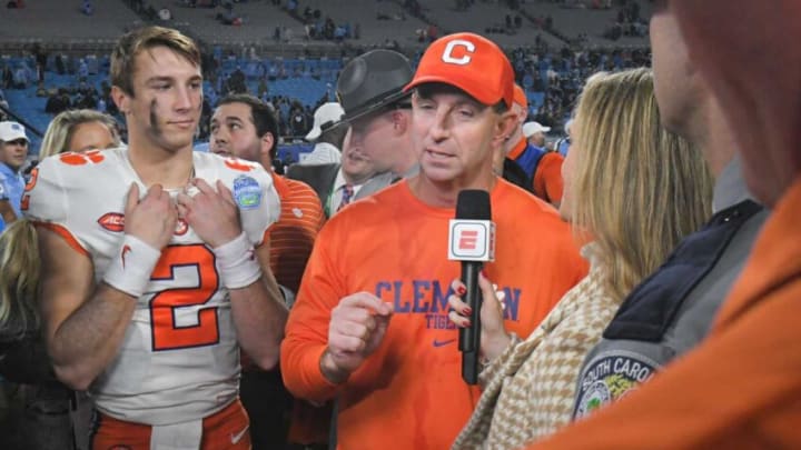 Clemson head coach Dabo Swinney is interviewed by ESPN near quarterback Cade Klubnik (2), game MVP, after the game with North Carolina in the ACC Championship football gameat Bank of America Stadium in Charlotte, North Carolina Saturday, Dec 3, 2022. Clemson won 39-10.Clemson Tigers Football Vs North Carolina Tar Heels Acc Championship Charlotte Nc