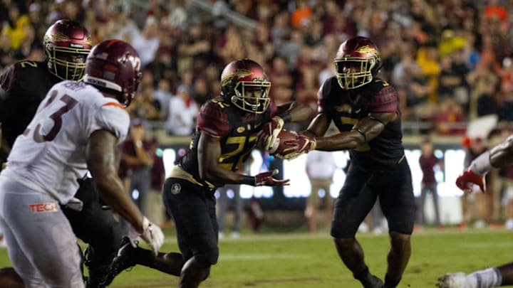 TALLAHASSEE, FL - SEPTEMBER 03: Florida State Seminoles running back Cam Akers (3) hands the ball off to Florida State Seminoles running back Amir Rasul (22) during the game between the Florida State Seminoles and the Virginia Tech Hokies September 03, 2018, at Doak Campbell Stadium in Tallahassee, Florida.(Photo by Logan Stanford/Icon Sportswire via Getty Images)