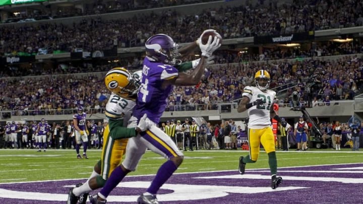 Sep 18, 2016; Minneapolis, MN, USA; Minnesota Vikings wide receiver Stefon Diggs (14) catches a touchdown pass past Green Bay Packers cornerback Damarious Randall (23) in the third quarter at U.S. Bank Stadium. The Vikings win 17-14. Mandatory Credit: Bruce Kluckhohn-USA TODAY Sports