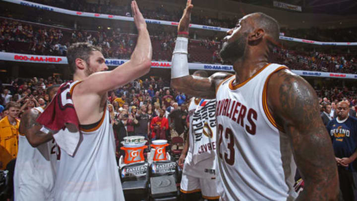 CLEVELAND, OH – MAY 23: Kevin Love #0 and LeBron James #23 of the Cleveland Cavaliers high five after Game Four of the Eastern Conference Finals against the Boston Celtics during the 2017 NBA Playoffs on May 23, 2017, at Quicken Loans Arena in Cleveland, Ohio. NOTE TO USER: User expressly acknowledges and agrees that, by downloading and or using this Photograph, the user is consenting to the terms and conditions of the Getty Images License Agreement. Mandatory Copyright Notice: Copyright 2017 NBAE (Photo by Nathaniel S. Butler/NBAE via Getty Images)