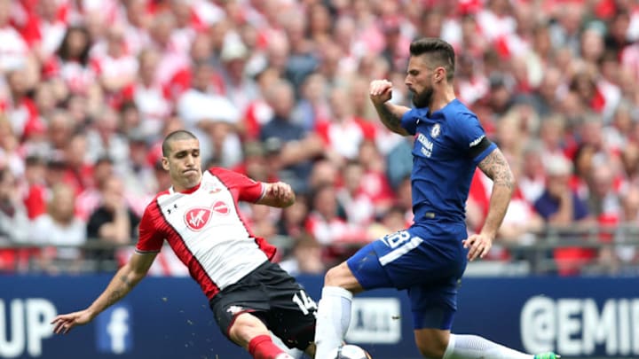 LONDON, ENGLAND - APRIL 22: Oriol Romeu of Southampton tackles Olivier Giroud of Chelsea during the The Emirates FA Cup Semi Final match between Chelsea and Southampton at Wembley Stadium on April 22, 2018 in London, England. (Photo by Dan Istitene/Getty Images)