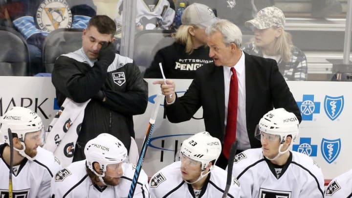 NHL Power Rankings: Los Angeles Kings head coach Darryl Sutter (rear right) gestures on the bench against the Pittsburgh Penguins in overtime at the PPG PAINTS Arena. The Kings won 1-0 in overtime. Mandatory Credit: Charles LeClaire-USA TODAY Sports