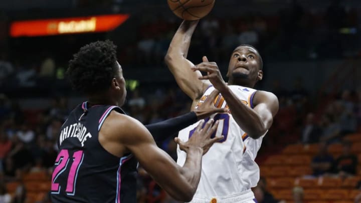 Josh Jackson #20 of the Phoenix Suns dunks against the Miami Heat (Photo by Michael Reaves/Getty Images)