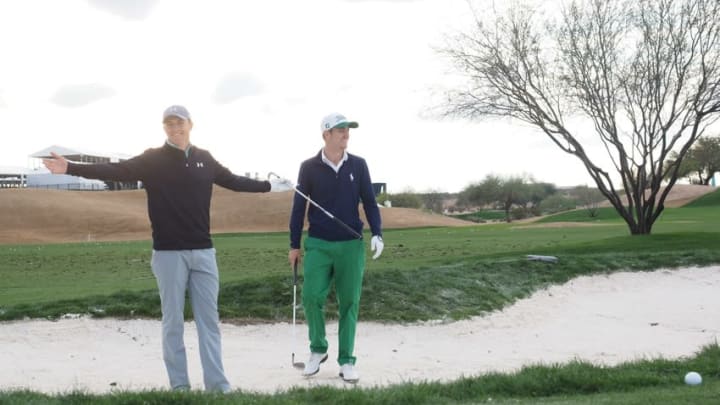 Jan 31, 2015; Scottsdale, AZ, USA; Jordan Spieth (left) practices with Justin Thomas (right) after the completion of the third round of the Waste Management Phoenix Open at TPC Scottsdale. Mandatory Credit: Allan Henry-USA TODAY Sports