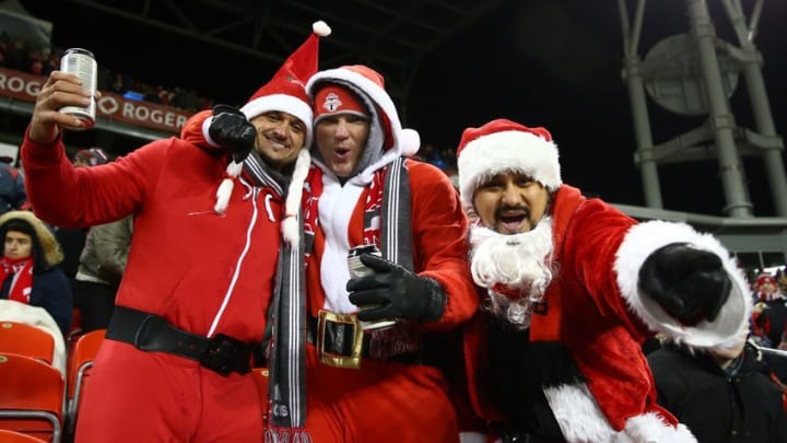 Dec 10, 2016; Toronto, Canada; Toronto FC fans dressed in Santa Claus outfits for Christmas during the game against the Seattle Sounders during the first half in the 2016 MLS Cup at BMO Field. Mandatory Credit: Mark J. Rebilas-USA TODAY Sports