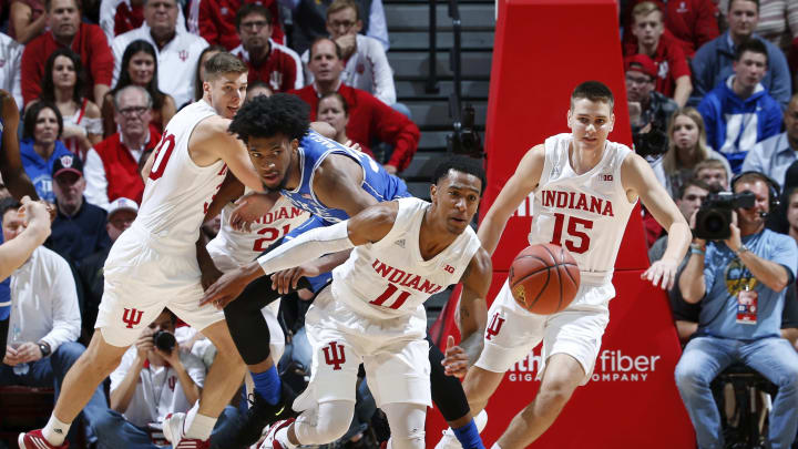 BLOOMINGTON, IN – NOVEMBER 29: Green #11 and McRoberts #15 of the Indiana Hoosiers battle for a loose ball. (Photo by Joe Robbins/Getty Images)