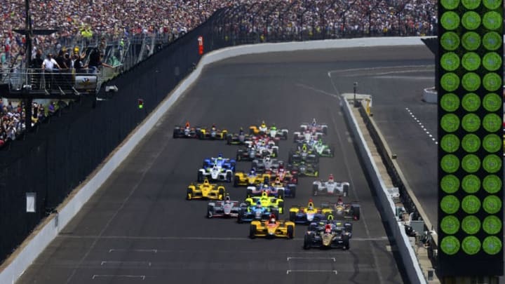 INDIANAPOLIS, IN - MAY 29: James Hinchcliffe of Canada driver of the #5 Schmidt Peterson Motorsports Honda leads at the start of the 100th running of the Indianapolis 500 mile race at the Indianapolis Motor Speedway on May 29, 2016 in Indianapolis, Indiana. (Photo by Robert Laberge/Getty Images)