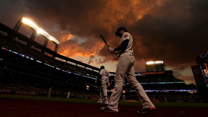 NEW YORK, NEW YORK - JUNE 21: Yoenis Cespedes #52 and Neil Walker #20 of the New York Mets get ready t bat in the fourth inning against the Kansas City Royals at Citi Field on June 21, 2016 in the Flushing neighborhood of the Queens borough of New York City. (Photo by Mike Stobe/Getty Images)