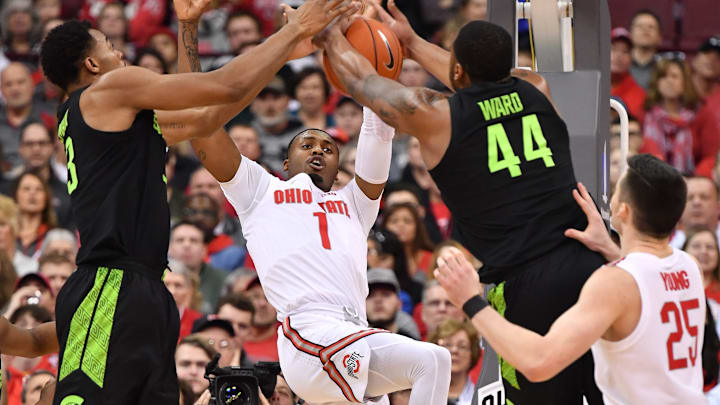 COLUMBUS, OH – JANUARY 5: Luther Muhammad #1 of the Ohio State Buckeyes battles for a rebound with Xavier Tillman #23 of the Michigan State Spartans and Nick Ward #44 of the Michigan State Spartans in the second half on January 5, 2019 at Value City Arena in Columbus, Ohio. Michigan State defeated Ohio State 86-77. (Photo by Jamie Sabau/Getty Images)