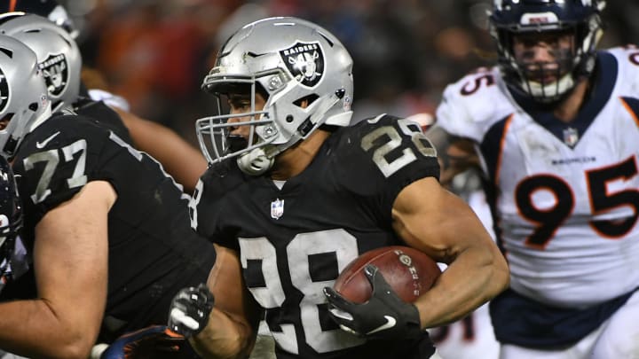 OAKLAND, CA – DECEMBER 24: Doug Martin #28 of the Oakland Raiders rushes with the ball against the Denver Broncos during their NFL game at Oakland-Alameda County Coliseum on December 24, 2018 in Oakland, California. (Photo by Robert Reiners/Getty Images)
