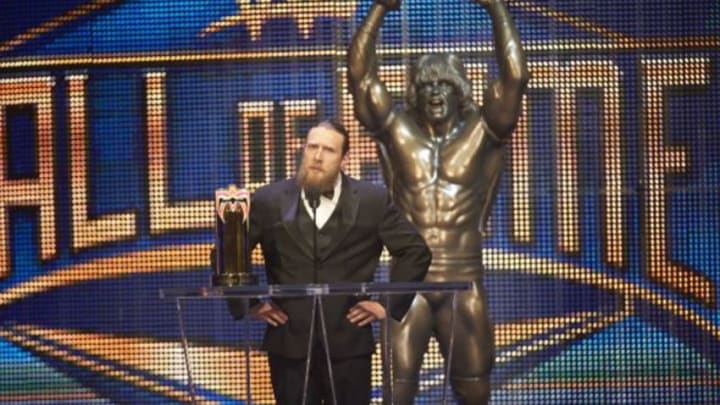 Professional Wrestling: WWE Hall of Fame Induction: Daniel Bryan at podium with Ultimate Warrior statue behind him during ceremony at SAP Center. San Jose, CA 3/28/2015 CREDIT: Jed Jacobsohn (Photo by Jed Jacobsohn /Sports Illustrated/Getty Images) (Set Number: X159444 TK1 )
