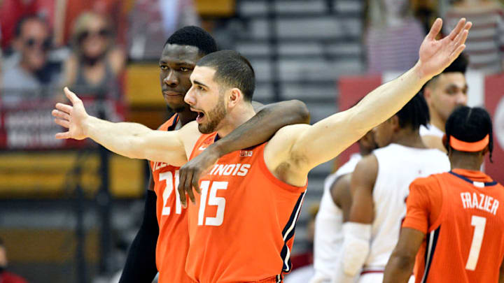 Feb 2, 2021; Bloomington, Indiana, USA; Illinois Fighting Illini forward Giorgi Bezhanishvili (15) is embraced by Illinois Fighting Illini center Kofi Cockburn (21) during the second half at Simon Skjodt Assembly Hall. Mandatory Credit: Marc Lebryk-USA TODAY Sports