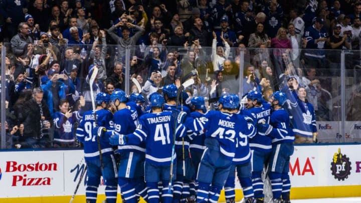 TORONTO, ON - FEBRUARY 1: Mitch Marner #16 of the Toronto Maple Leafs celebrates with teammates after scoring the game winning overtime goal against the Ottawa Senators at the Scotiabank Arena on February 1, 2020 in Toronto, Ontario, Canada. (Photo by Mark Blinch/NHLI via Getty Images)