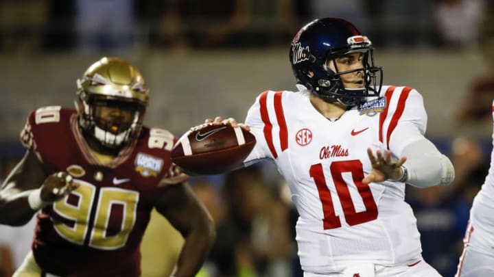 Sep 5, 2016; Orlando, FL, USA; Mississippi Rebels quarterback Chad Kelly (10) drops back to pass in the first quarter against the Florida State Seminoles at Camping World Stadium. Mandatory Credit: Logan Bowles-USA TODAY Sports