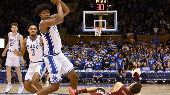 DURHAM, NORTH CAROLINA - DECEMBER 31: Vernon Carey Jr. #1 of the Duke Blue Devils takes the ball away from Derryck Thornton #11 of the Boston College Eagles during the second half of their game at Cameron Indoor Stadium on December 31, 2019 in Durham, North Carolina. Duke won 88-49. (Photo by Grant Halverson/Getty Images)