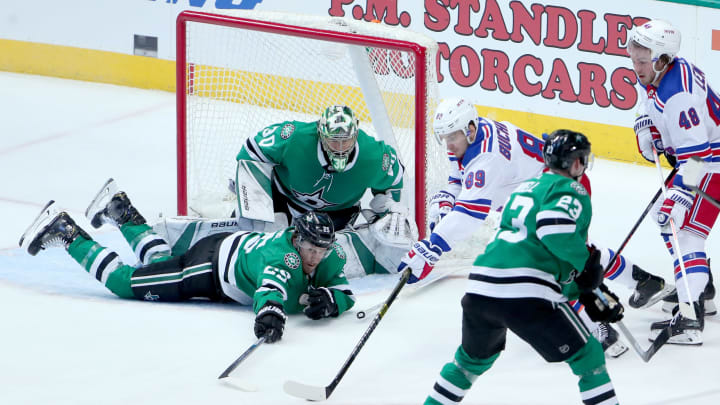 DALLAS, TEXAS – MARCH 05: Pavel Buchnevich #89 of the New York Rangers controls the puck against Ben Bishop #30 of the Dallas Stars and Brett Ritchie #25 of the Dallas Stars in the third period at American Airlines Center on March 05, 2019 in Dallas, Texas. (Photo by Tom Pennington/Getty Images)