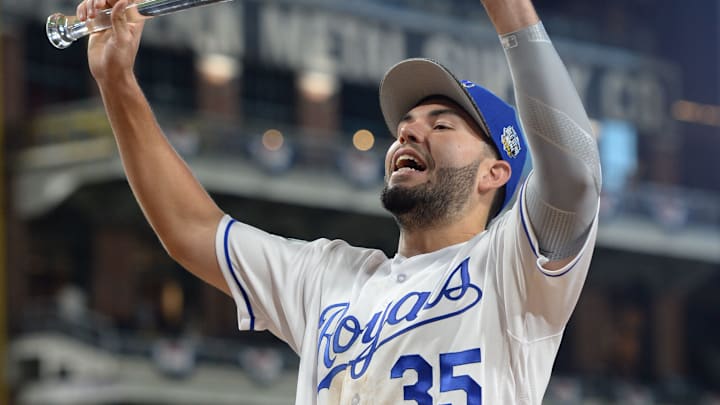 American League infielder Eric Hosmer (35) of the Kansas City Royals holds the MVP trophy – Mandatory Credit: Jake Roth-USA TODAY Sports