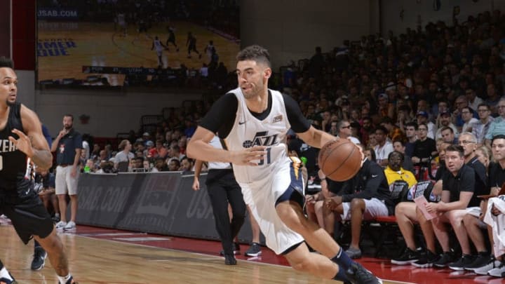 LAS VEGAS, NV - JULY 7: Georges Niang #31 of the Utah Jazz handles the ball against the Portland Trail Blazers during the 2018 Las Vegas Summer League on July 7, 2018 at the Cox Pavilion in Las Vegas, Nevada. NOTE TO USER: User expressly acknowledges and agrees that, by downloading and/or using this Photograph, user is consenting to the terms and conditions of the Getty Images License Agreement. Mandatory Copyright Notice: Copyright 2018 NBAE (Photo by David Dow/NBAE via Getty Images)