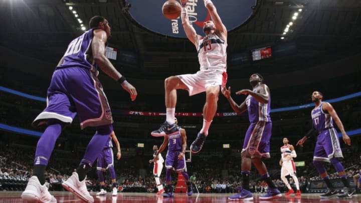 WASHINGTON, DC -  NOVEMBER 13: Marcin Gortat #13 of the Washington Wizards dunks the ball against the Sacramento Kings on November 13, 2017 at Capital One Arena in Washington, DC. NOTE TO USER: User expressly acknowledges and agrees that, by downloading and or using this Photograph, user is consenting to the terms and conditions of the Getty Images License Agreement. Mandatory Copyright Notice: Copyright 2017 NBAE (Photo by Ned Dishman/NBAE via Getty Images)