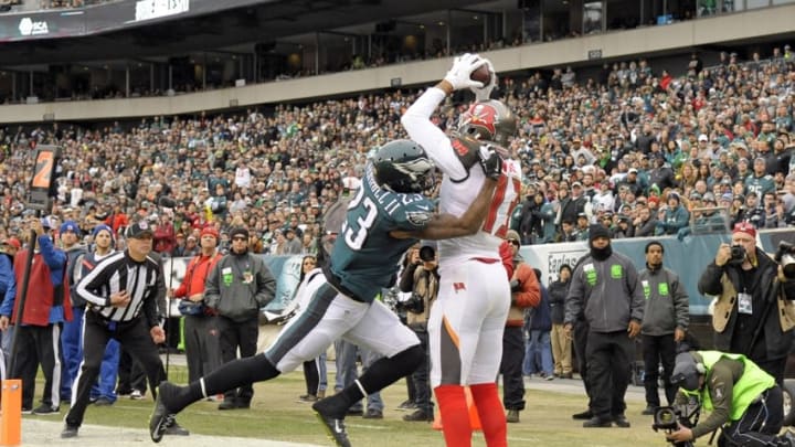 Nov 22, 2015; Philadelphia, PA, USA; Tampa Bay Buccaneers wide receiver Mike Evans (13) catches 4-yard touchdown pass against Philadelphia Eagles cornerback Nolan Carroll (23) during the first quarter at Lincoln Financial Field. Mandatory Credit: Eric Hartline-USA TODAY Sports