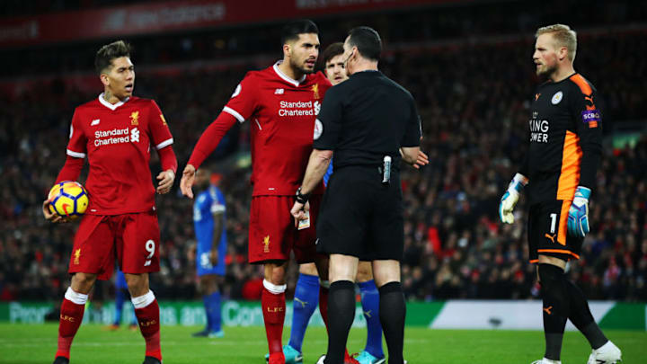 LIVERPOOL, ENGLAND - DECEMBER 30: Emre Can of Liverpool confronts referee Neil Swarbrick after some confrontation with Harry Maguire of Leicester City after Liverpool's first goal during the Premier League match between Liverpool and Leicester City at Anfield on December 30, 2017 in Liverpool, England. (Photo by Clive Brunskill/Getty Images)